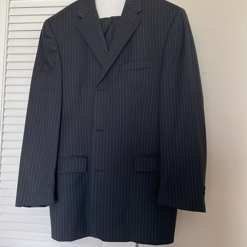 Kenneth Cole reaction, men’s pinstripe suit. Excellent condition.